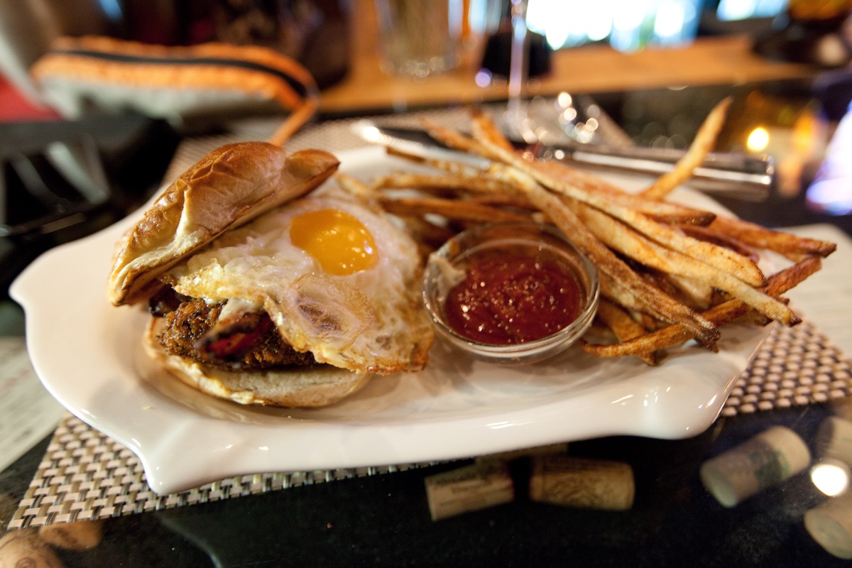 Burger with a fried egg and hand-cut fries